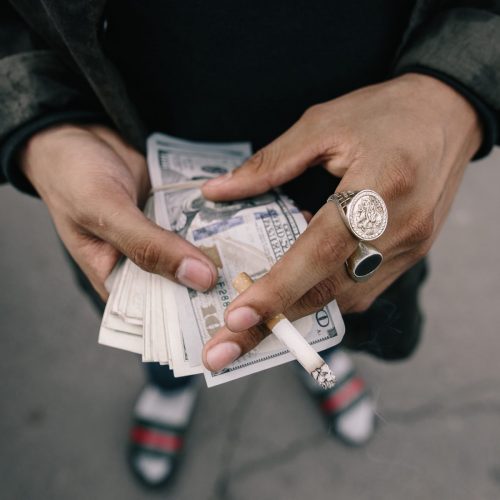 Man holding money at rehab